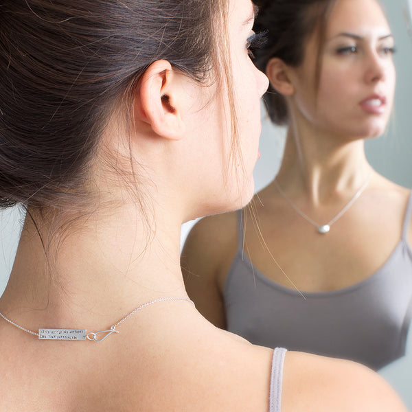 silver fortune cookie necklace on model