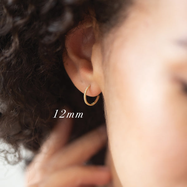 12 mm huggie hoop on model | christina kober