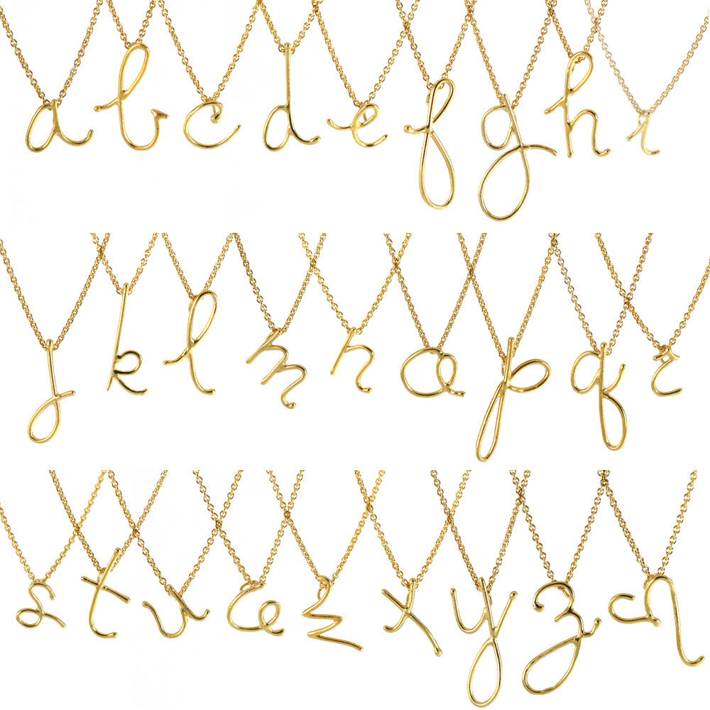 gold handwritten initials