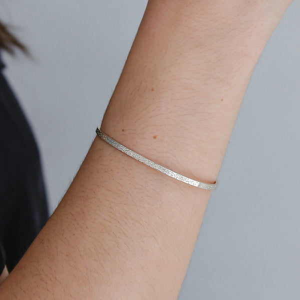 silver diamond dusted narrow cuff on model