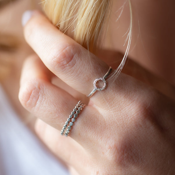 silver karma ring on model | christina kober