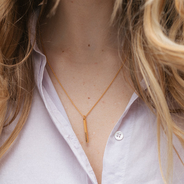 mini vertical bar necklace on model