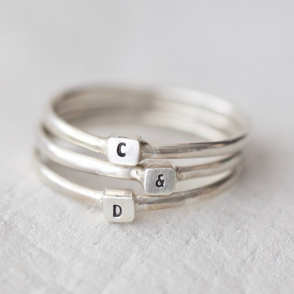 silver hand stamped element rings