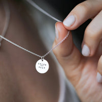 silver mini coin necklace on model