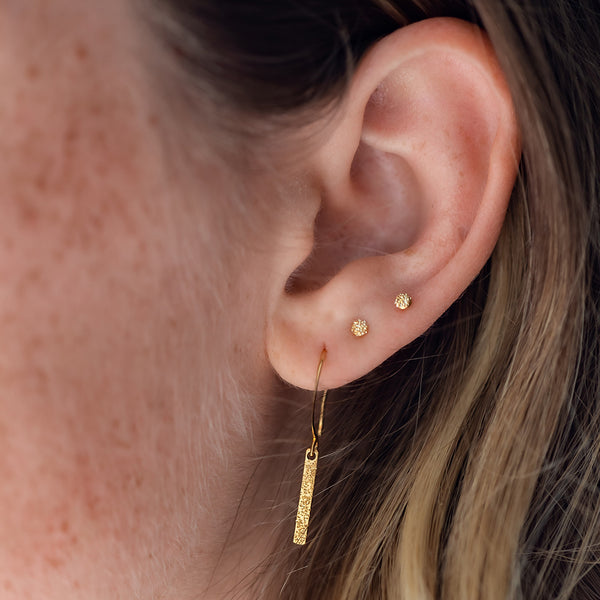 gold ear stack on model | christina kober