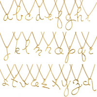 gold handwritten initials